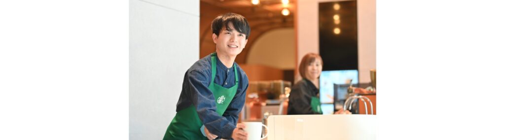 A man working at Starbucks